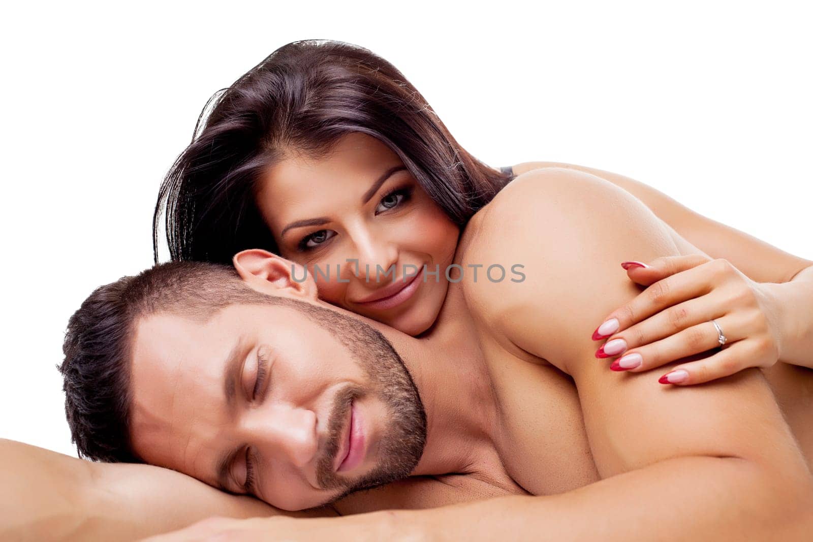 Image of nude lovers smiling dreamily at camera, isolated on white