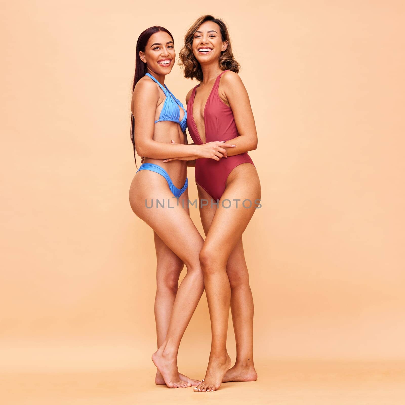 Bikini, beauty and portrait of friends happy for beach vacation together isolated in a studio brown background. Smile, fashion and women with swimsuit style for holiday with happiness in summer.