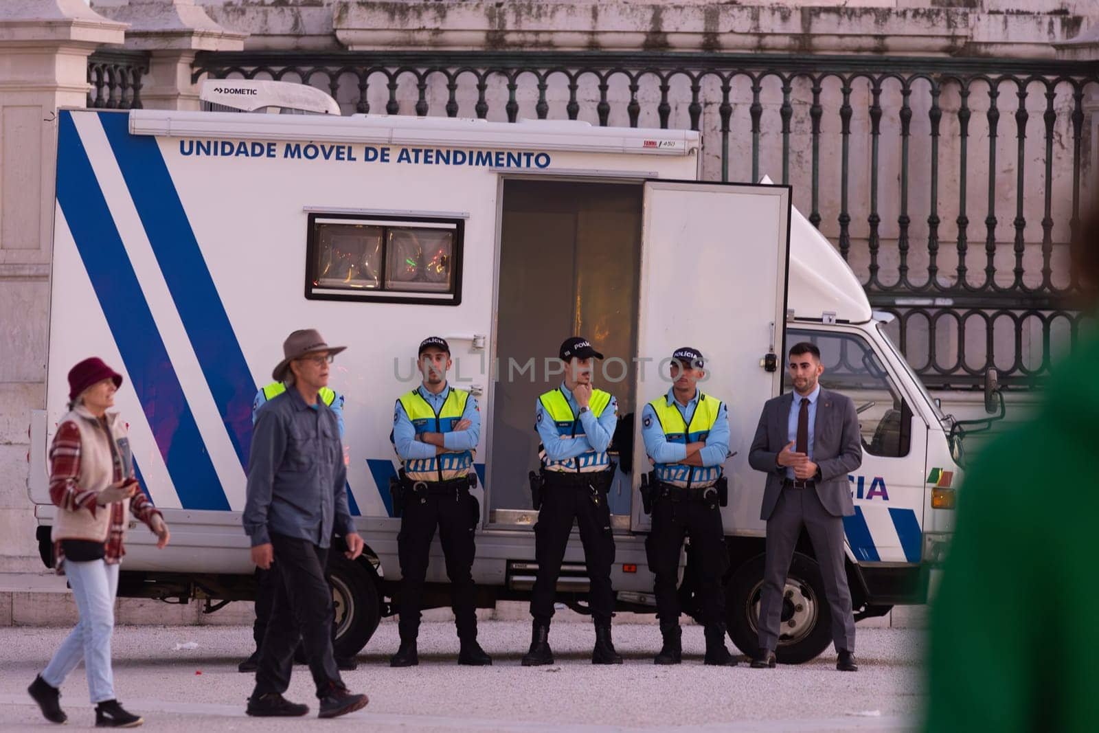 14 november 2023, Lisbon, Portugal - group of Police officer standing on praca do commerce and guard and protect - telephoto shot
