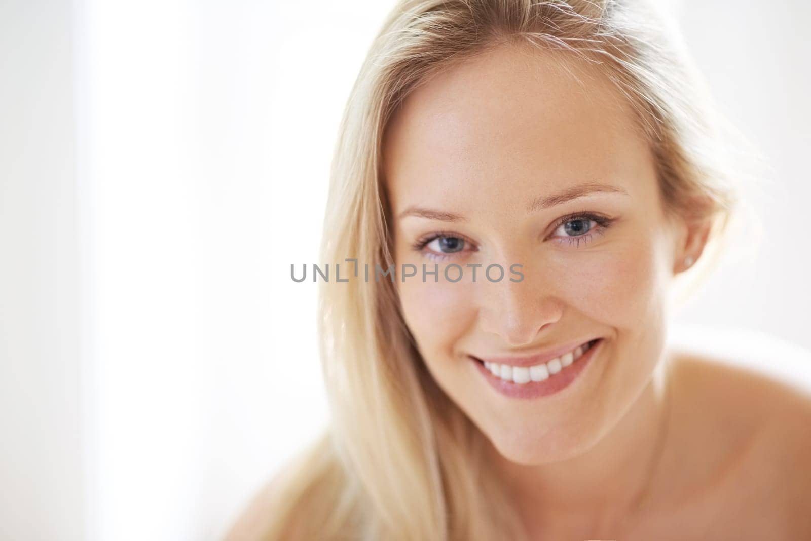 Closeup, happy woman and smile for beauty with portrait in home for skincare, texture and hydration. Female person, hair and face for results with dermatology, treatment or spf for anti aging of skin.