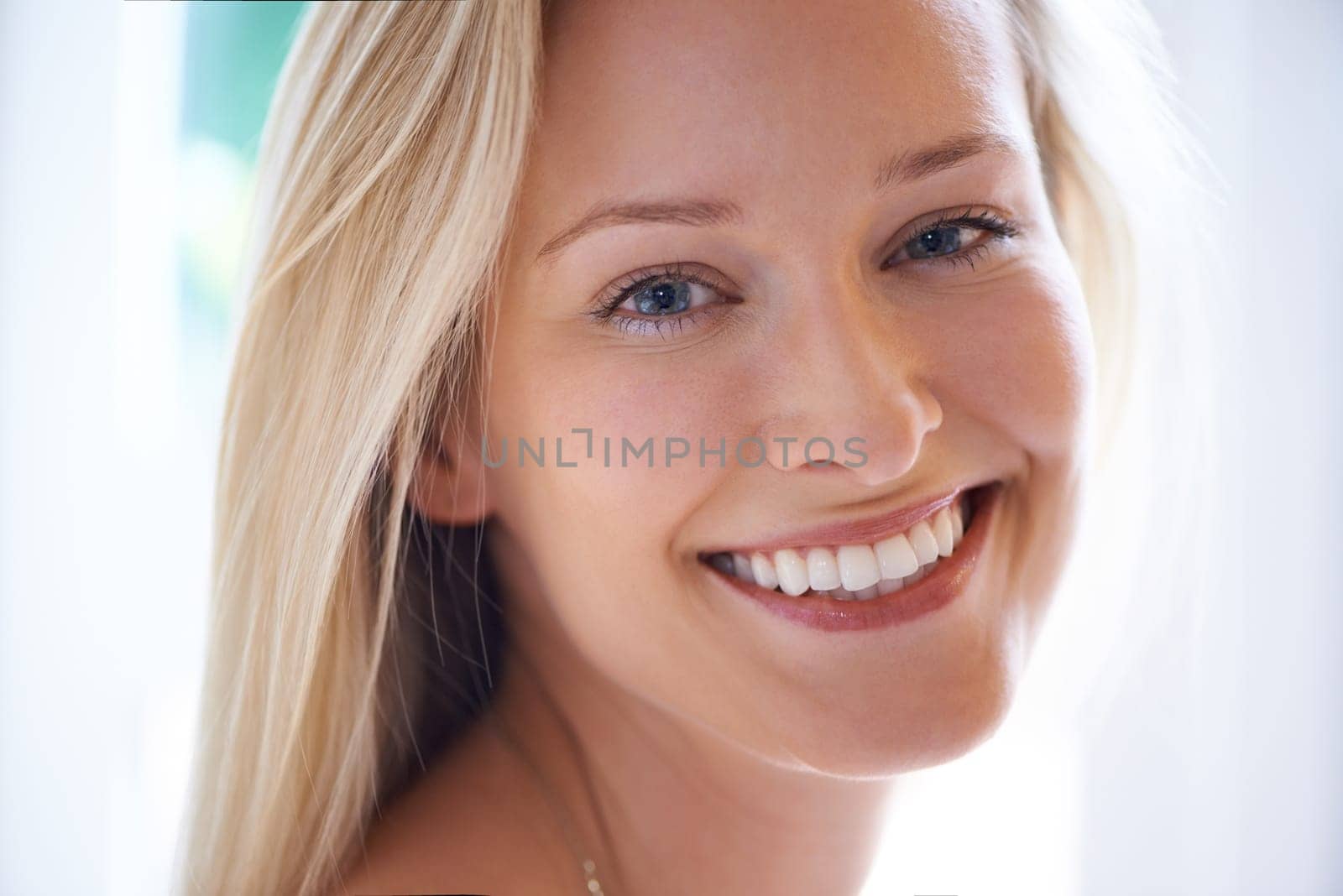 Portrait, happy woman and smile for beauty in home with closeup for dermatology in skincare. Female person, natural and cosmetics for anti aging, texture and hydration for skin, health and wellness.