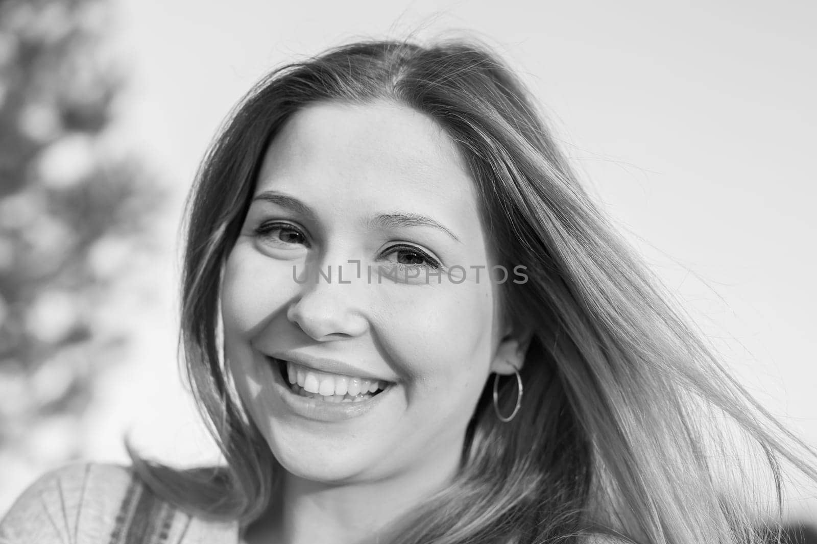 beautiful portrait of a carefree friendly approachable girl with a stunning smile and cute looks