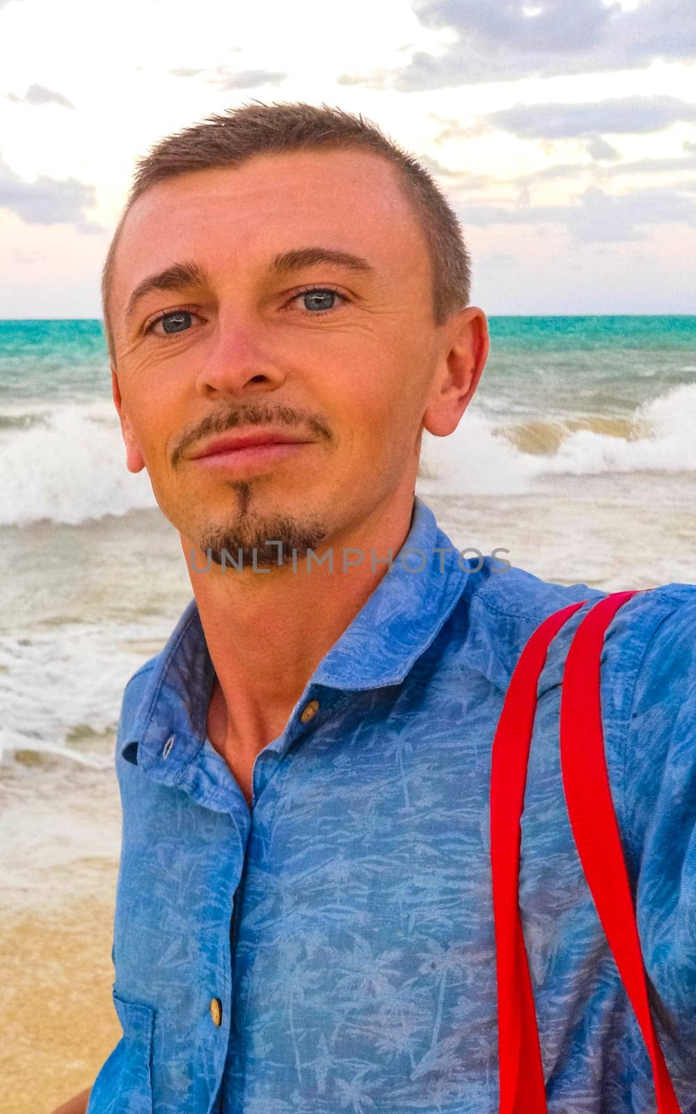 Male tourist Travelling man taking selfie Playa del Carmen Mexico. by Arkadij