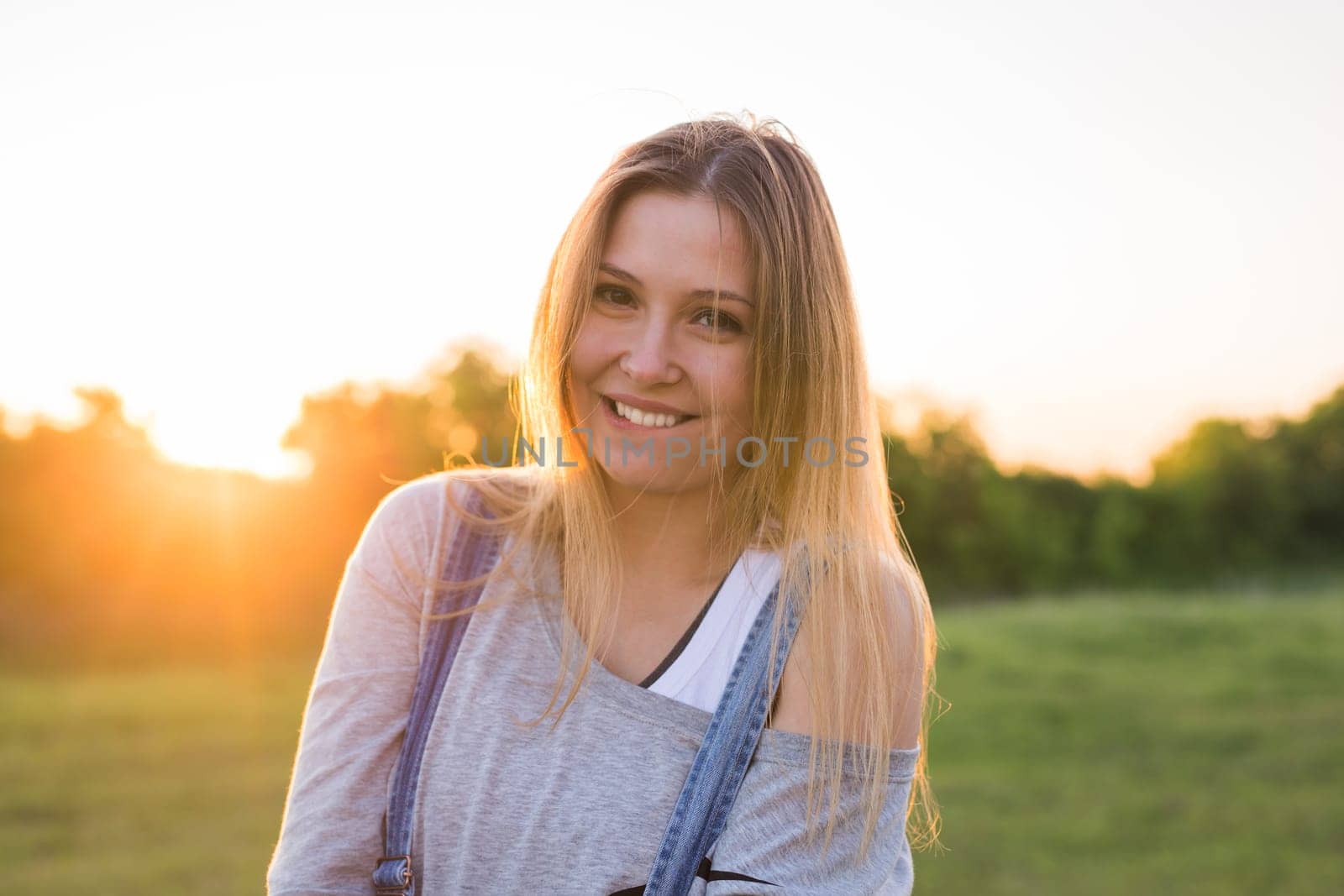 beautiful portrait of a carefree friendly approachable girl with a stunning smile and cute looks