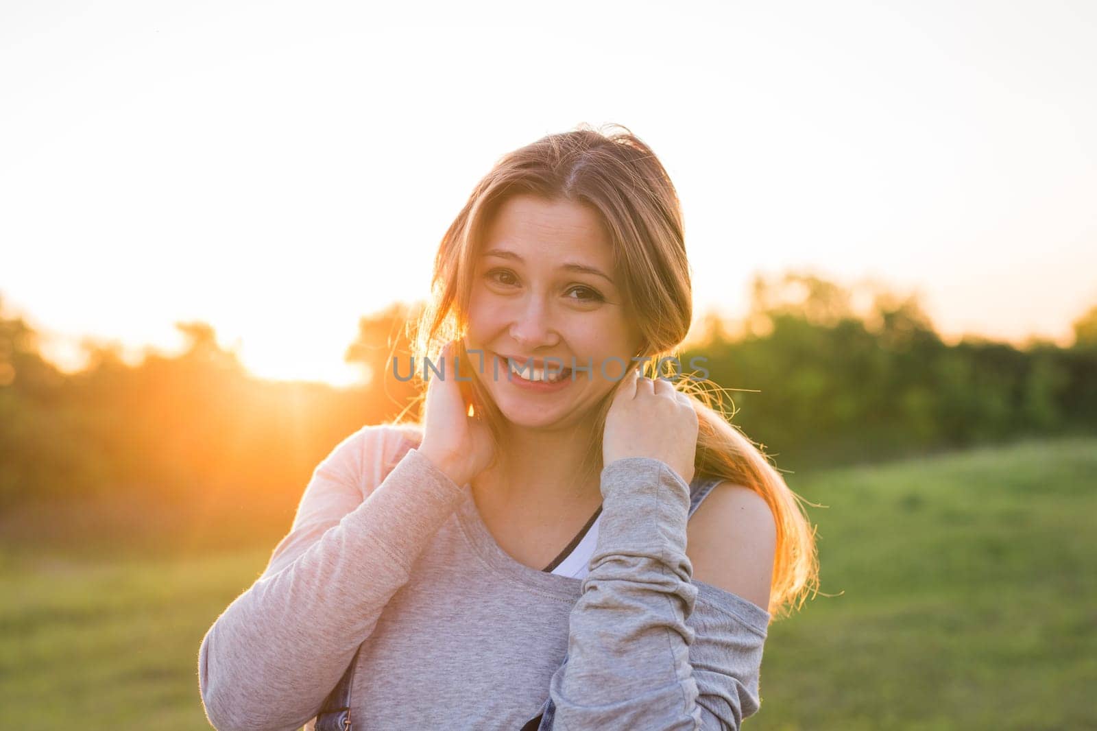 beautiful portrait of a carefree friendly approachable girl with a stunning smile and cute looks