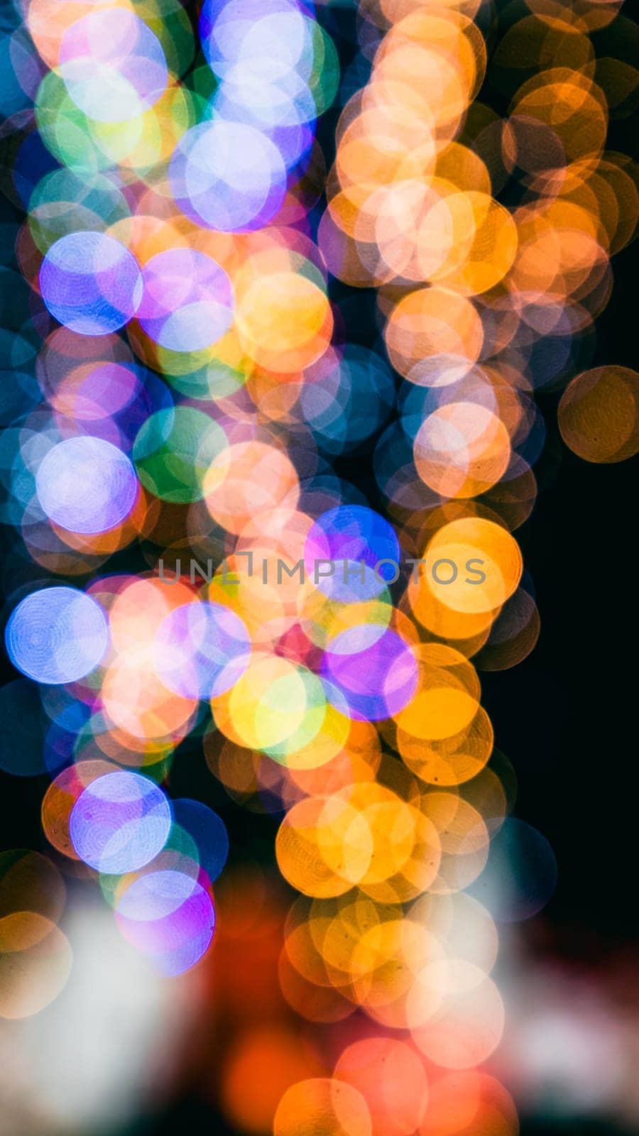 Christmas decorations. Colorful Christmas lights background by vladispas