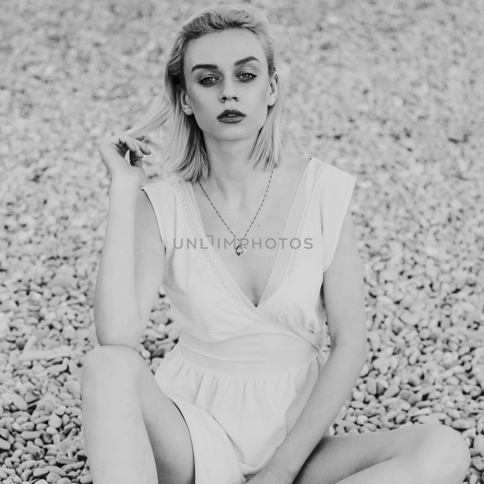 portrait of a beautiful fashionable woman black and white photo by Simakov