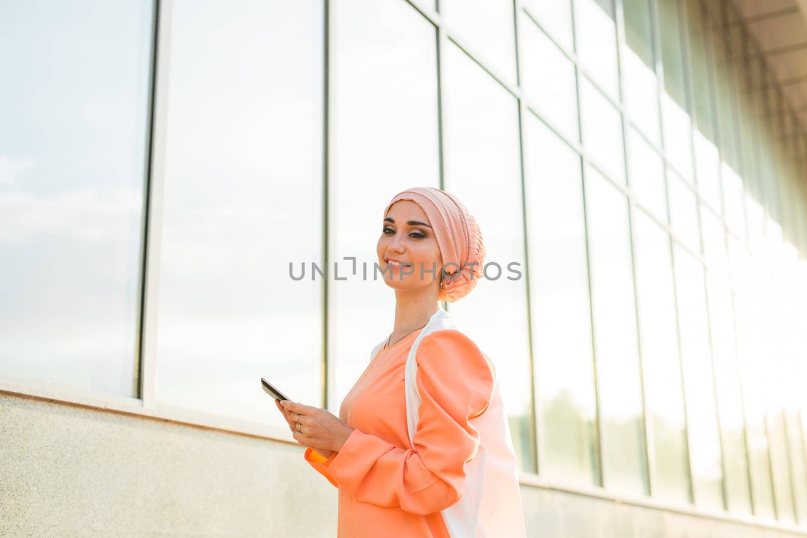 beautiful arabian girl with tablet computer. Muslim woman