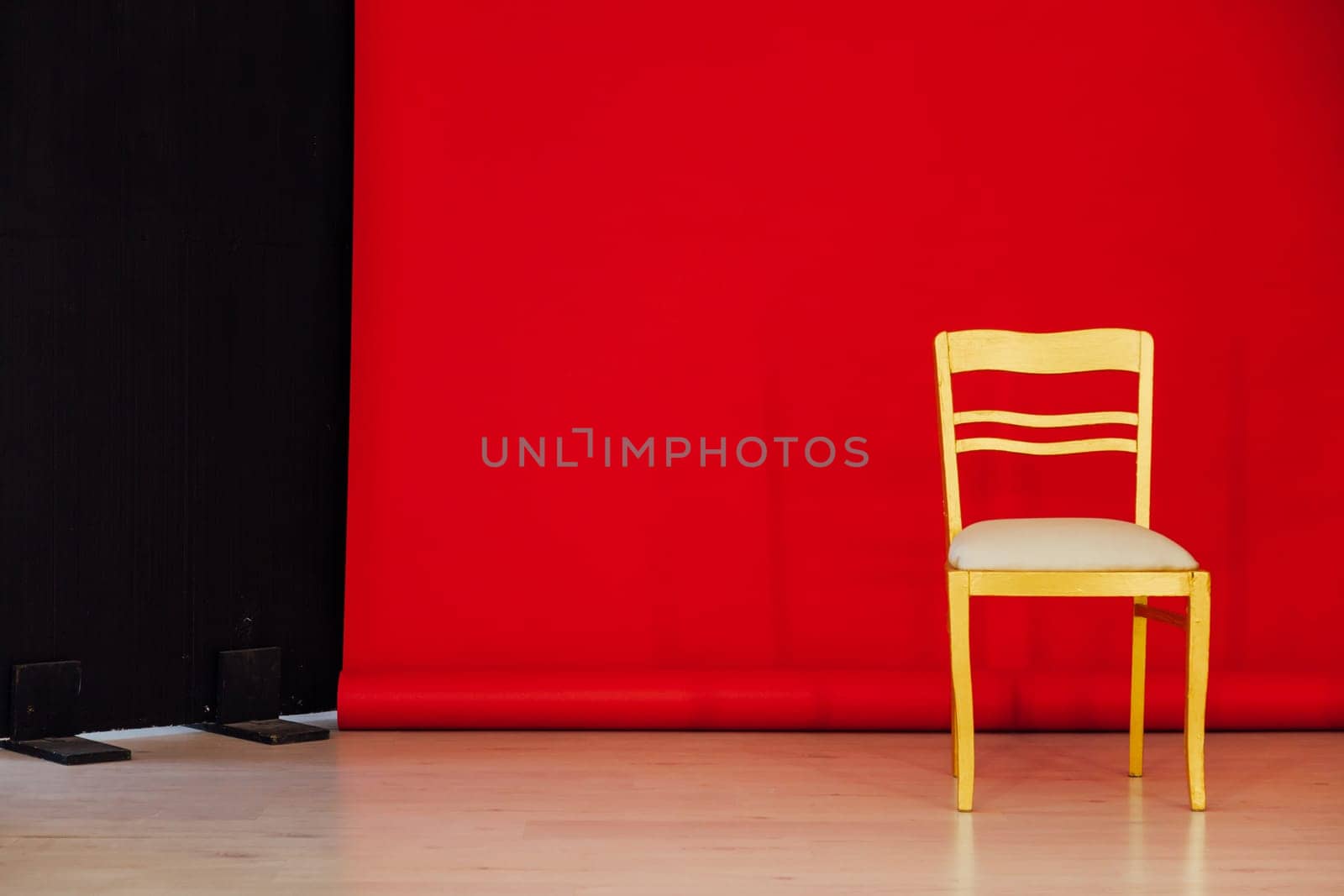 red black background room golden chair