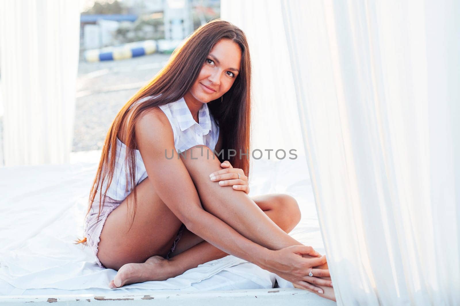 beautiful woman with long hair on the beach portrait