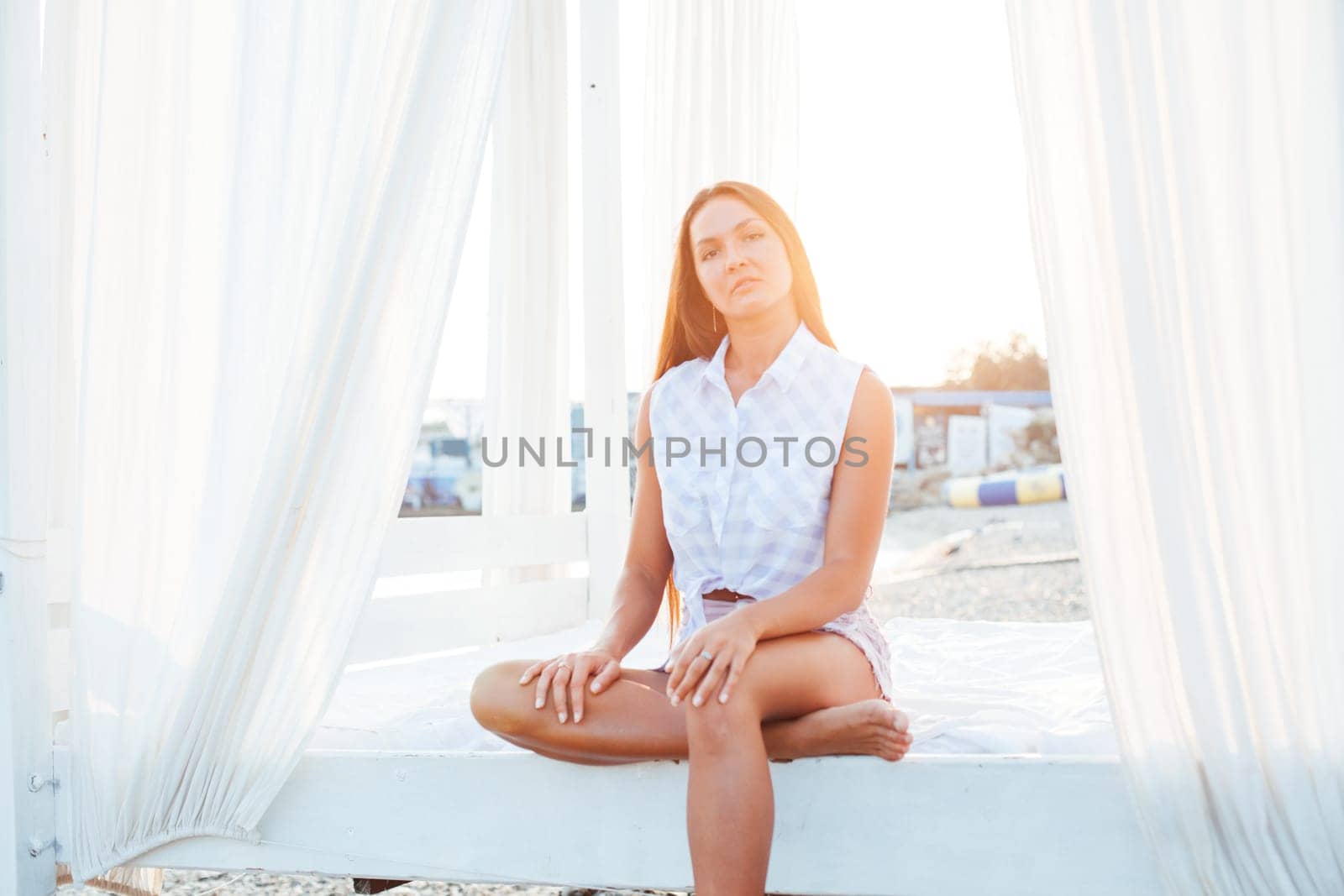 beautiful woman with long hair on the beach portrait