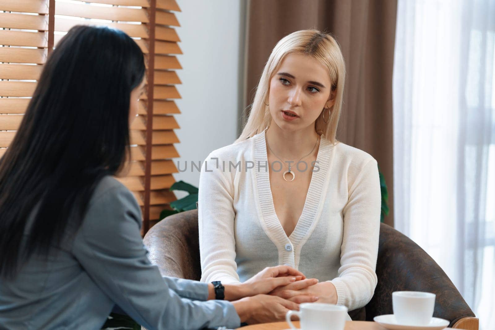 Psychological consultation on mental health or seeking help from professional, young patient on therapy session while psychiatrist making diagnostic on mental illness. Mental treatment session. Blithe