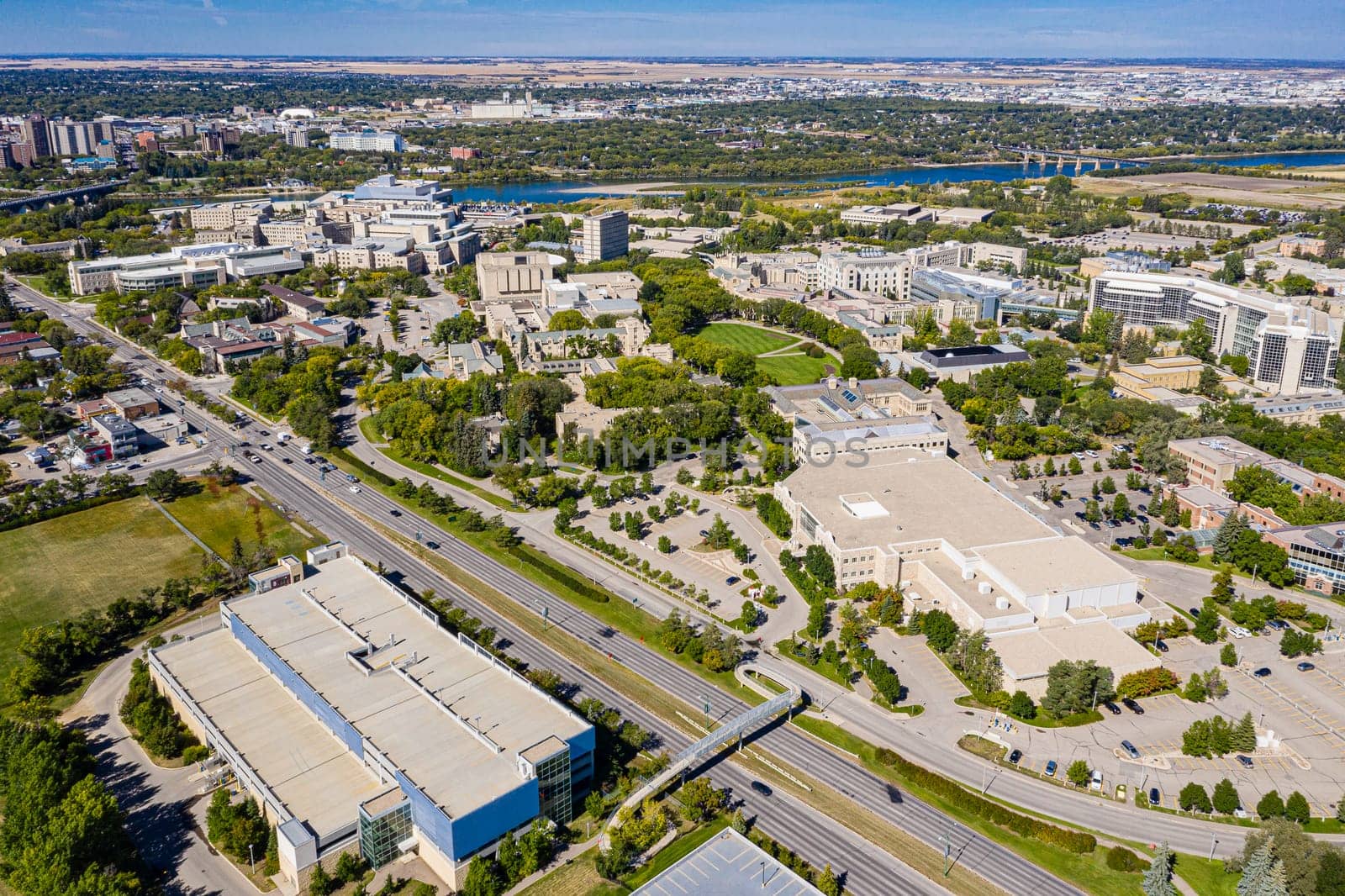 Hovering over the University of Saskatchewan, this drone image captures the campus' architectural splendor, and the flowing South Saskatchewan River, framing a legacy of education and innovation.