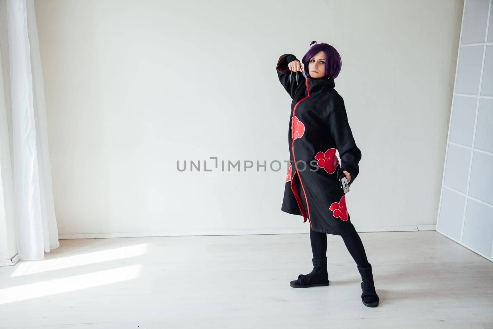 Anime cosplayer girl with purple hair