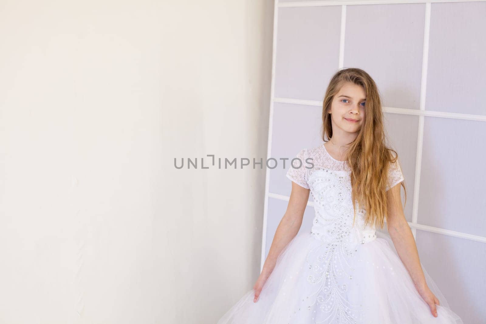 Portrait of a beautiful girl in a white ball gown by Simakov