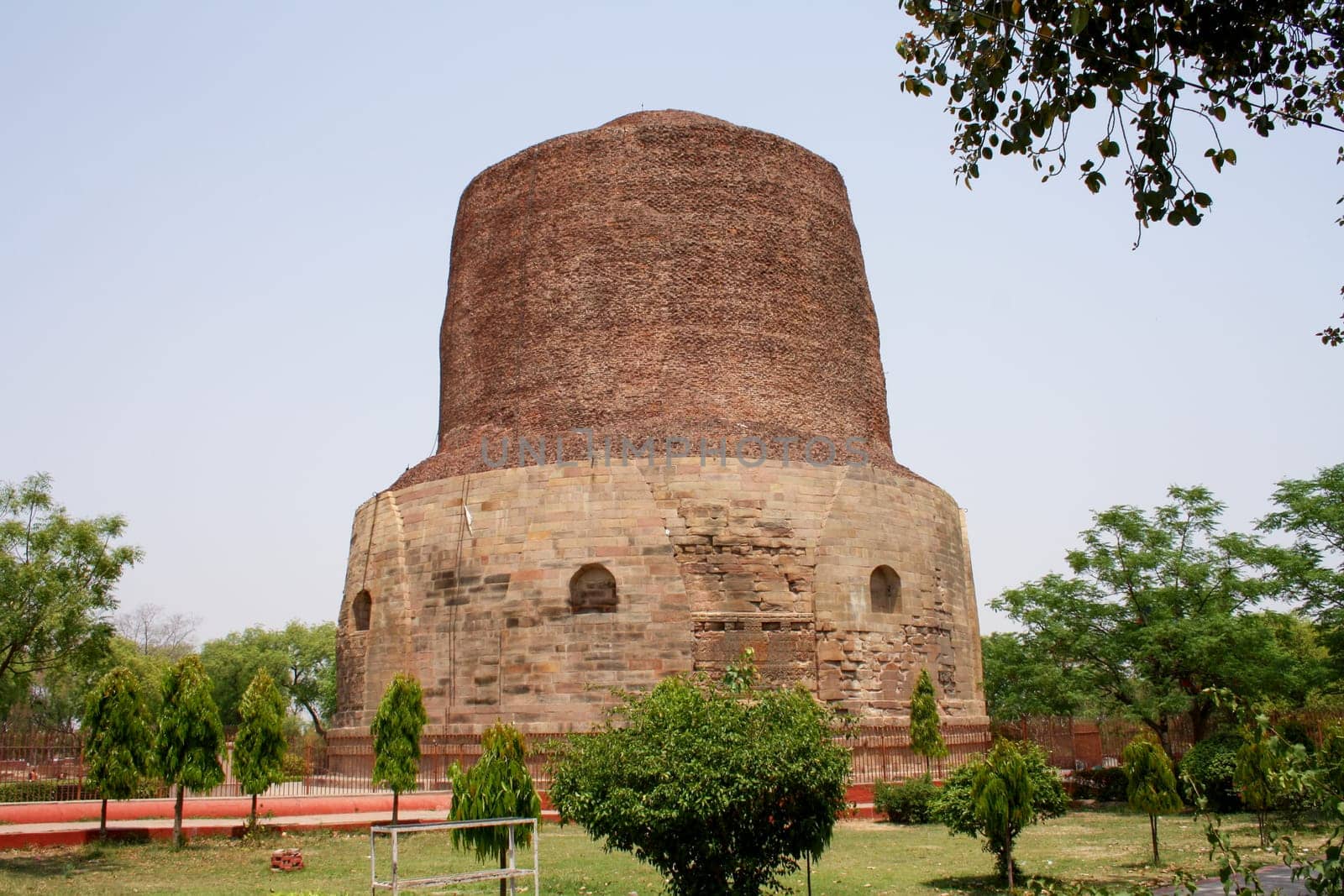 Sarnath, India - April 8, 2011: Historical buildings at Buddhist pilgrimage site.