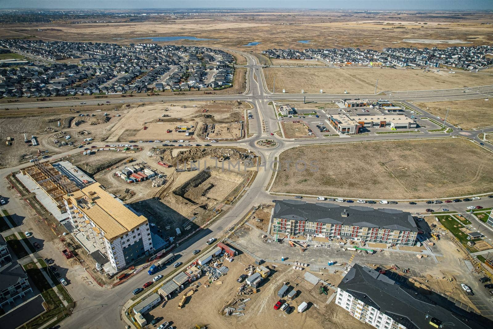 Stunning bird's-eye perspective of the Evergreen neighborhood in Saskatoon, showcasing the unique urban layout and the natural beauty of Saskatchewan's landscapes.
