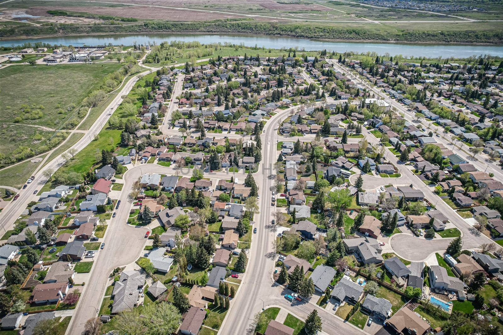 Aerial view of Silverwood Heights which is a mostly residential neighbourhood located in north-central Saskatoon, Saskatchewan, Canada. It is a suburban subdivision, composed mostly of single detached dwellings and some multiple-unit apartment and semi-detached dwellings. As of 2009, the area is home to 10,786 residents.
