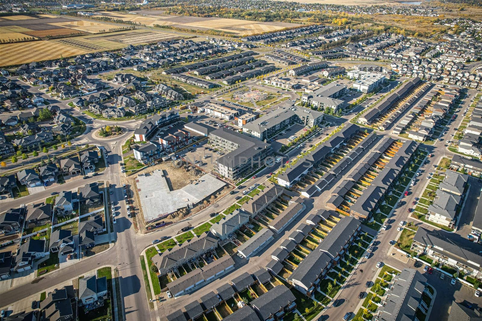 Stunning bird's-eye perspective of the Evergreen neighborhood in Saskatoon, showcasing the unique urban layout and the natural beauty of Saskatchewan's landscapes.