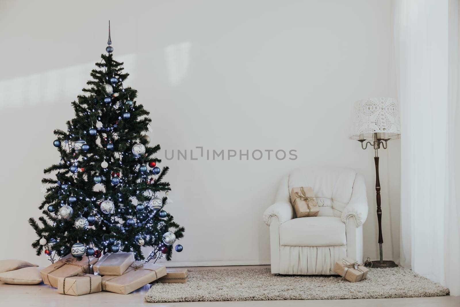 Christmas tree in a bright room new year gifts 1