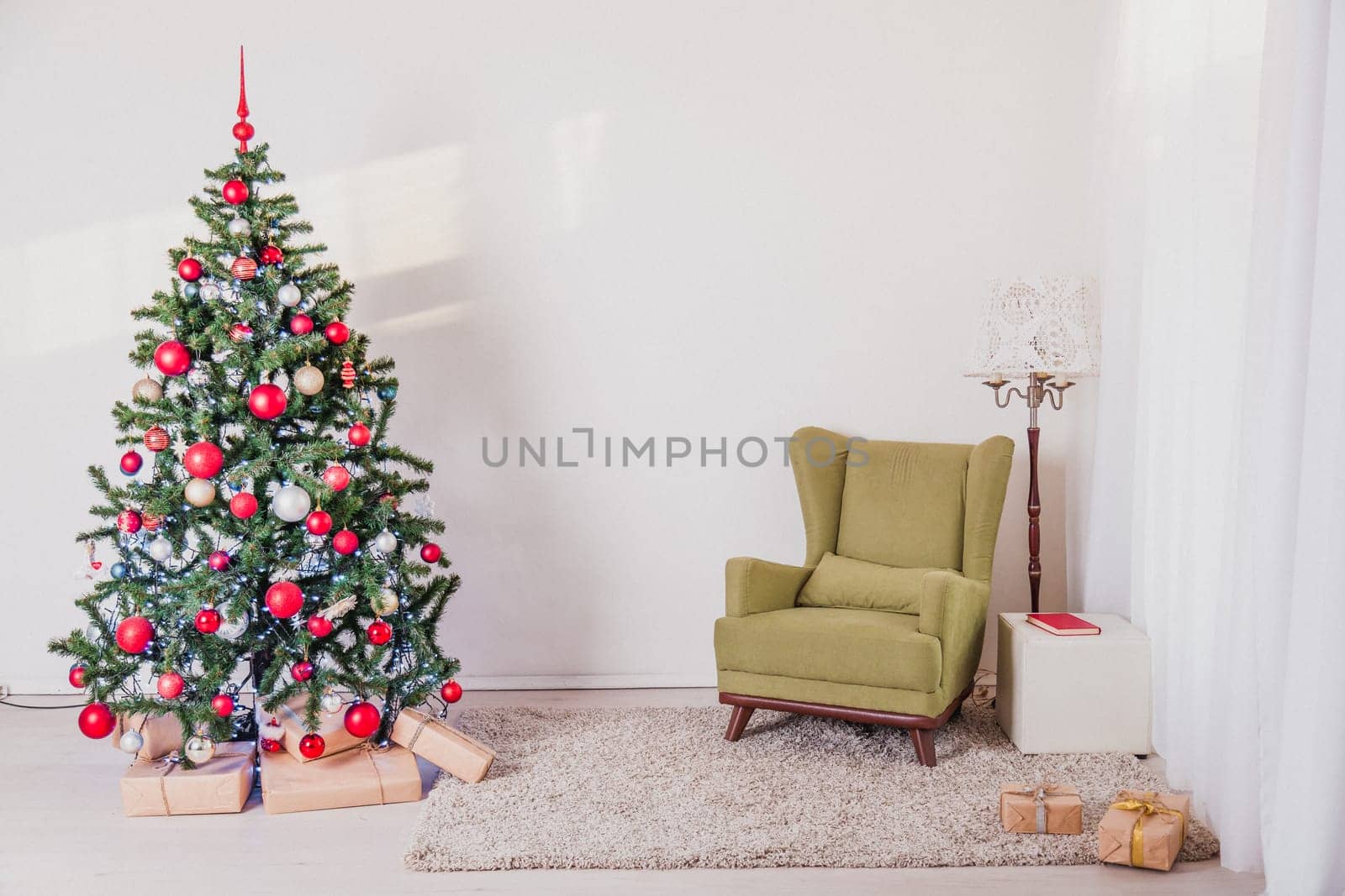 rozhestvenskaja tree in a white room on new year's Eve