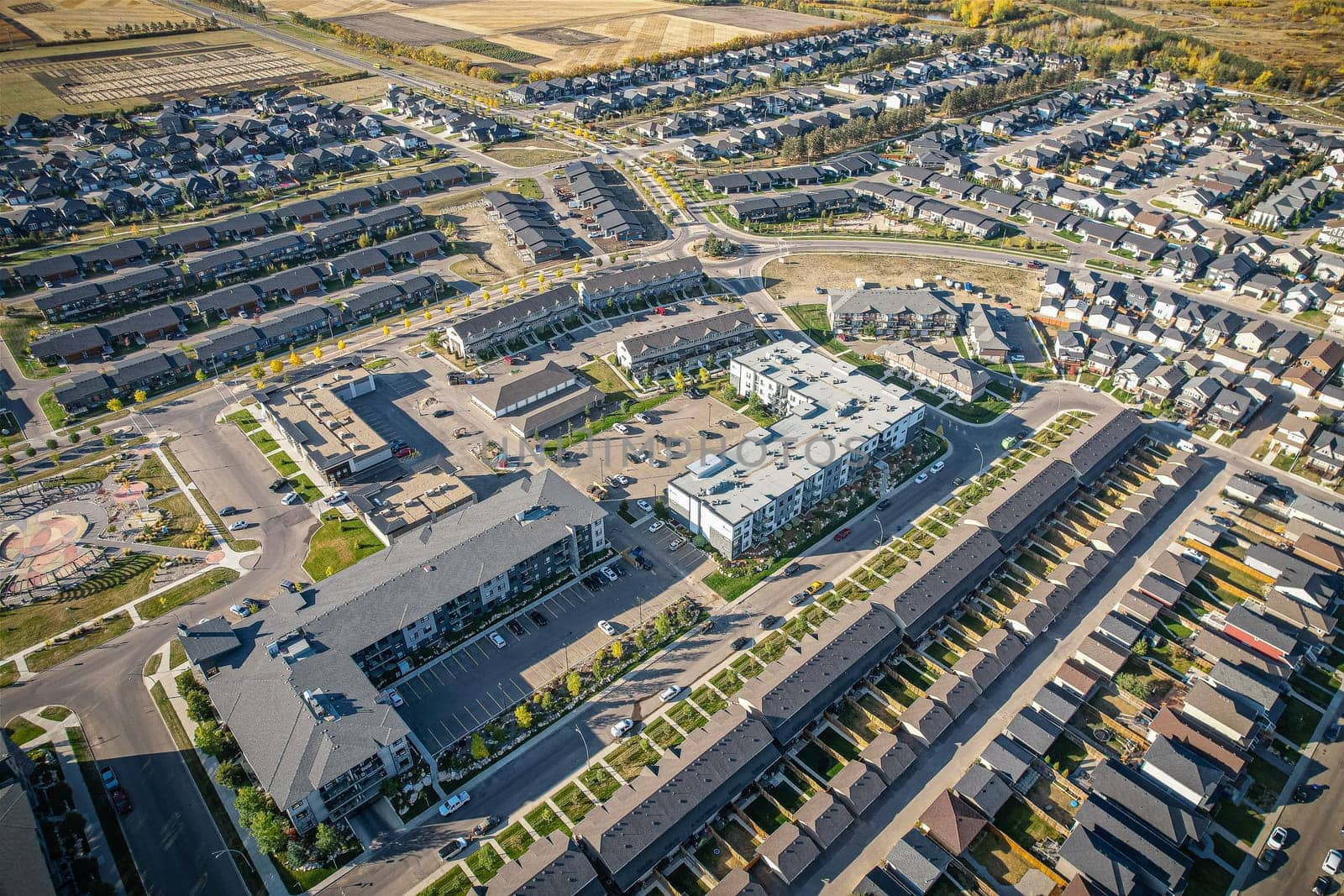 Stunning bird's-eye perspective of the Evergreen neighborhood in Saskatoon, showcasing the unique urban layout and the natural beauty of Saskatchewan's landscapes.