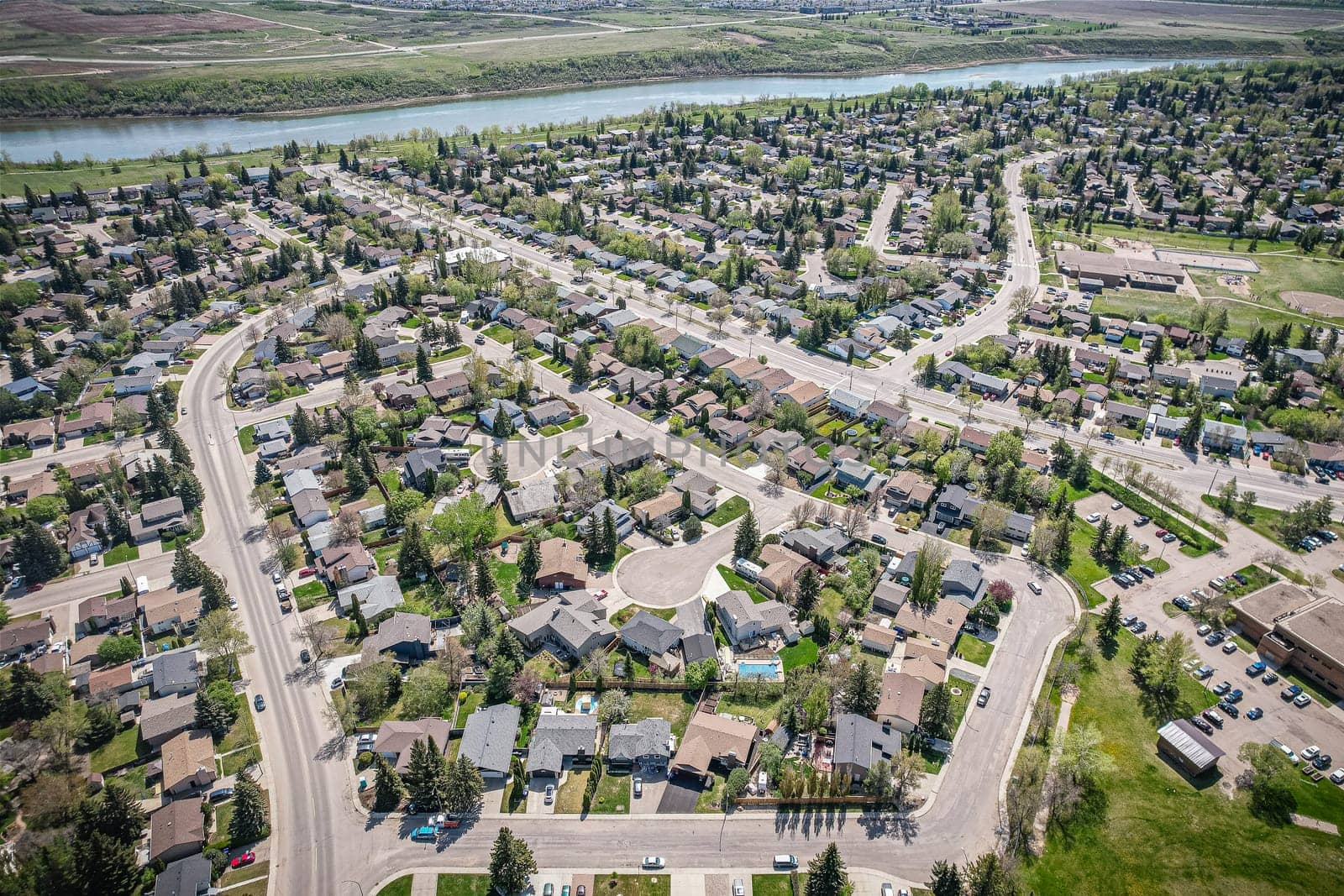 Aerial view of Silverwood Heights which is a mostly residential neighbourhood located in north-central Saskatoon, Saskatchewan, Canada. It is a suburban subdivision, composed mostly of single detached dwellings and some multiple-unit apartment and semi-detached dwellings. As of 2009, the area is home to 10,786 residents.
