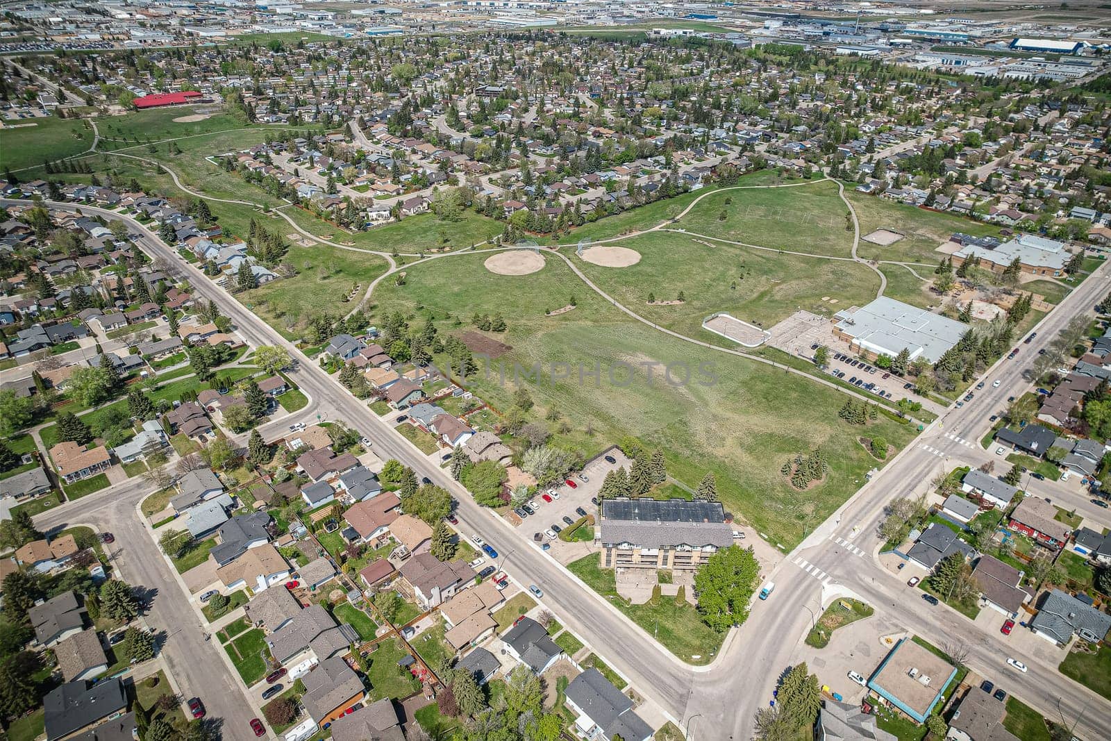 Aerial view of Silverwood Heights which is a mostly residential neighbourhood located in north-central Saskatoon, Saskatchewan, Canada. It is a suburban subdivision, composed mostly of single detached dwellings and some multiple-unit apartment and semi-detached dwellings. As of 2009, the area is home to 10,786 residents.