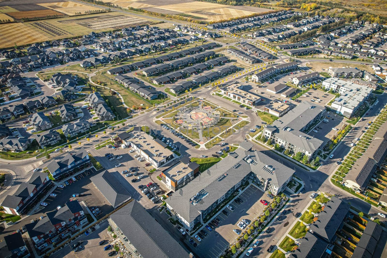 Stunning bird's-eye perspective of the Evergreen neighborhood in Saskatoon, showcasing the unique urban layout and the natural beauty of Saskatchewan's landscapes.