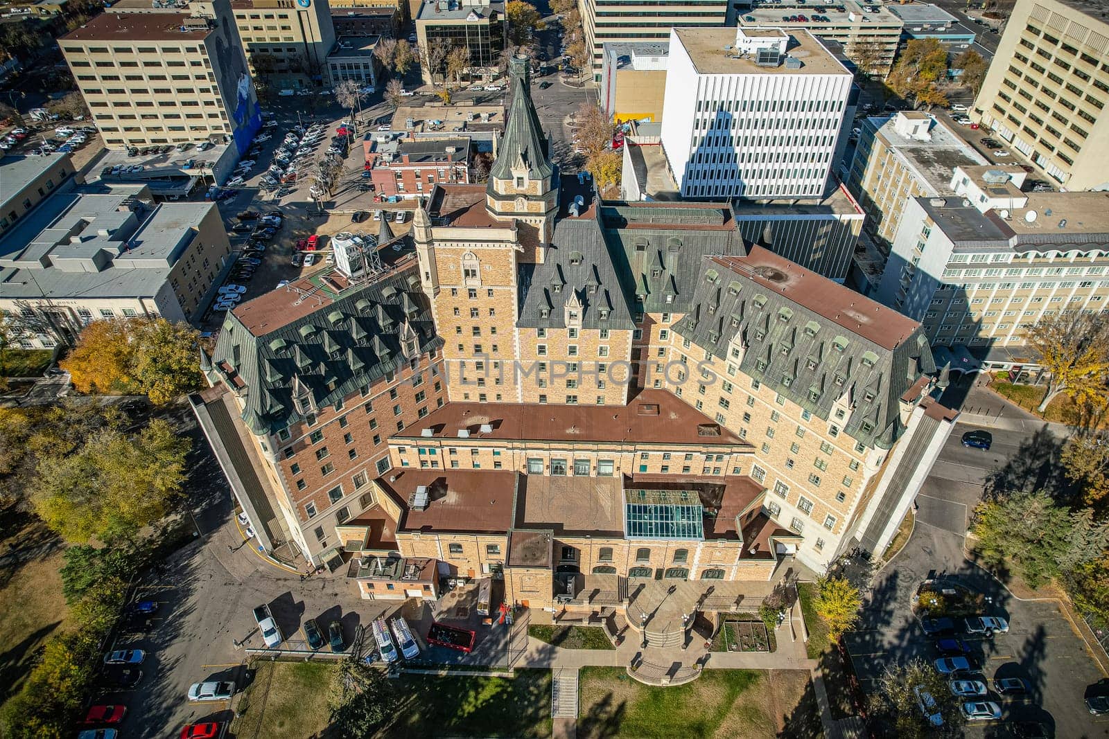 Aerial spectacle of downtown Saskatoon, revealing the city's architectural marvels, bustling streets, and the pulsating core of Saskatchewan's metropolis