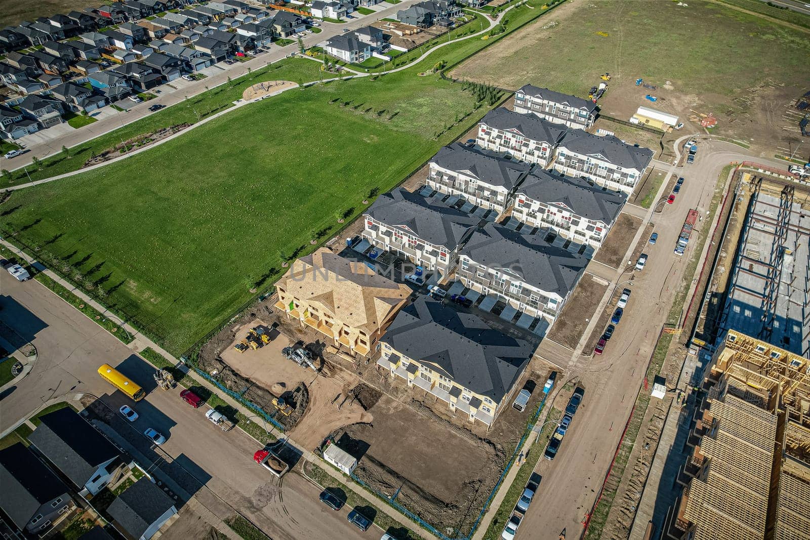 Stunning bird's-eye perspective of the Evergreen neighborhood in Saskatoon, showcasing the unique urban layout and the natural beauty of Saskatchewan's landscapes.