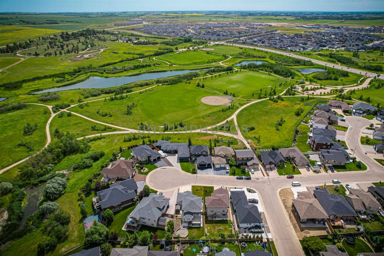 Aerial view of Briarwood which is a residential neighbourhood located in the southeast part of Saskatoon, Saskatchewan, Canada. The majority of its residents live in low-density, single detached dwellings.