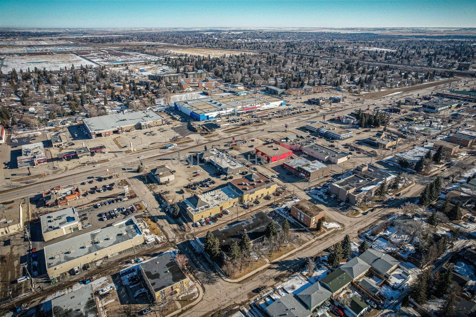 Aerial view of Brevoort Park which is a primarily residential neighbourhood located in the southeast part of Saskatoon, Saskatchewan, Canada. It includes part of the 8th Street business district. Just over half of its dwellings are single detached houses, with a sizeable minority of duplex or apartment-style multiple unit dwellings