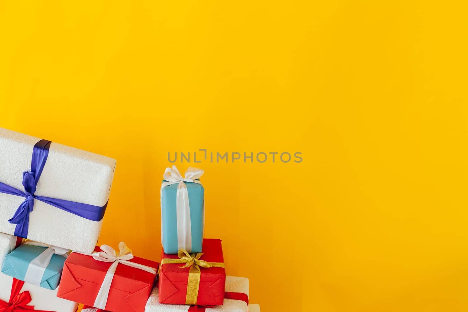 gift in the interior of the room with a yellow background by Simakov