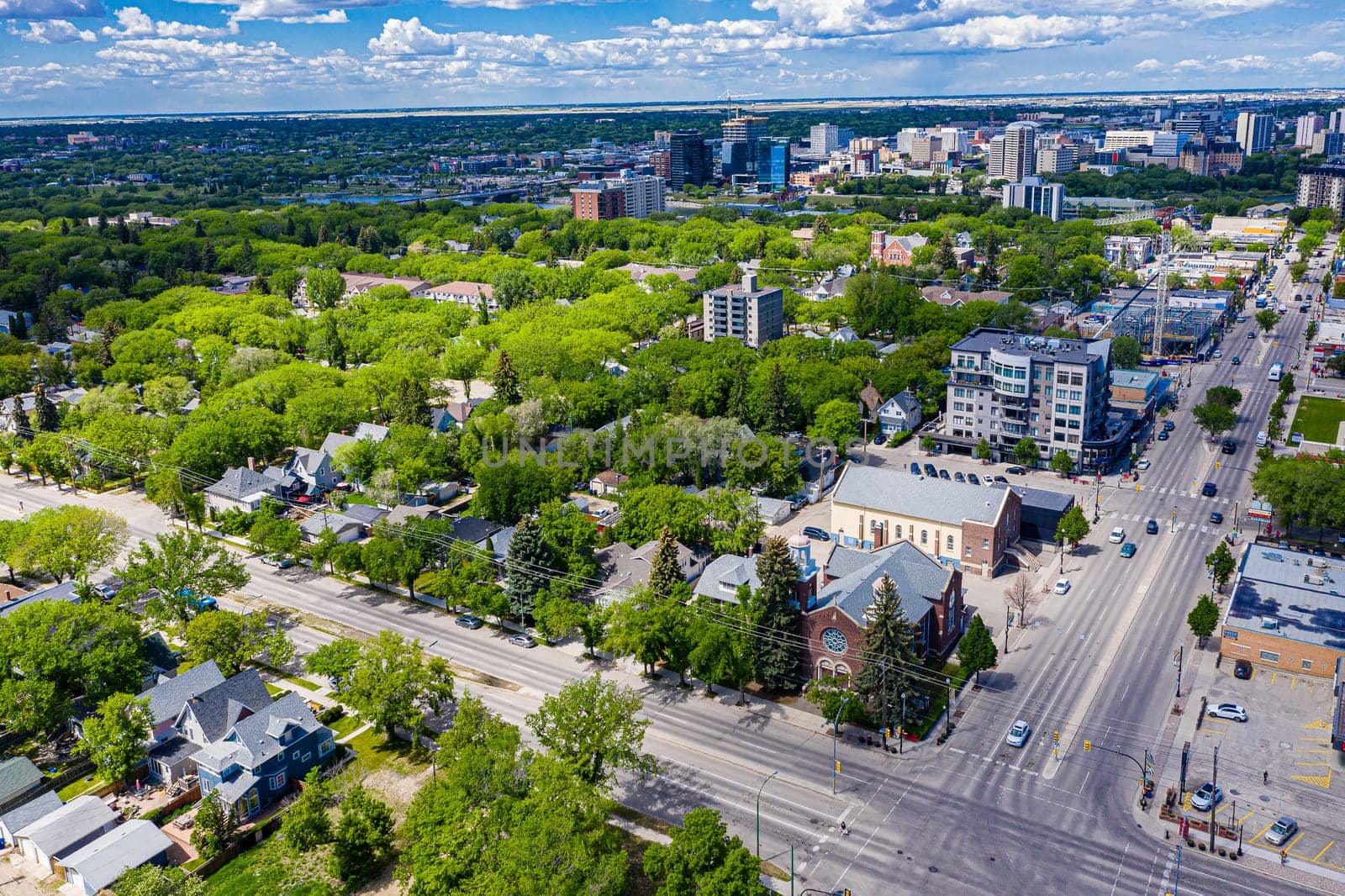 Captured from above, this drone image presents Broadway Avenue in Saskatoon in all its glory. Experience the bustling streets, unique urban charm, and vibrant community life from a spectacular aerial perspective.