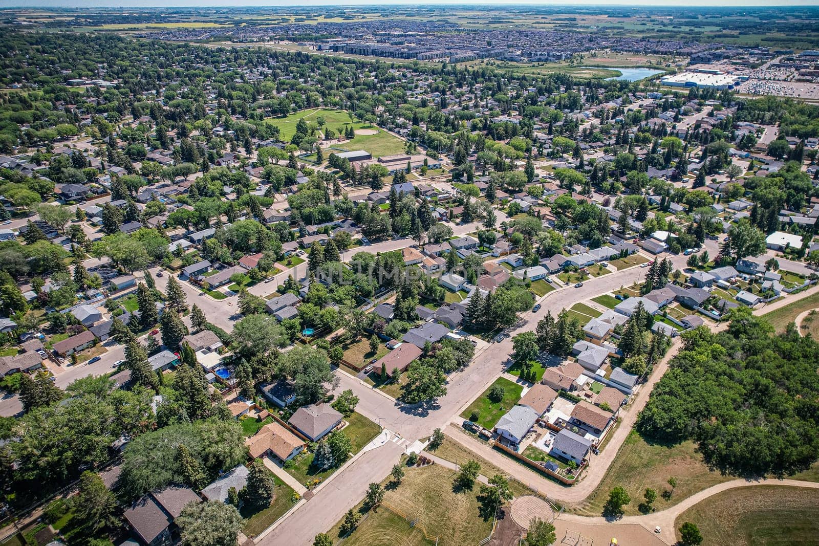Aerial view of Adelaide Churchill which is a mostly residential neighbourhood located in south-central Saskatoon, Saskatchewan, Canada. It is a suburban subdivision, consisting mostly of low-density, single detached dwellings. As of 2009, the area is home to 3,445 residents.