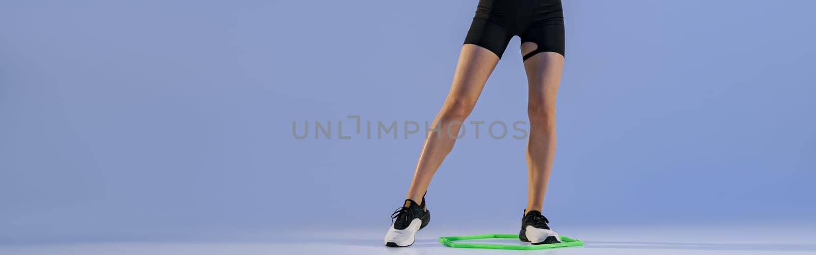 Fitness woman doing cardio training using special professional equipment . High quality photo