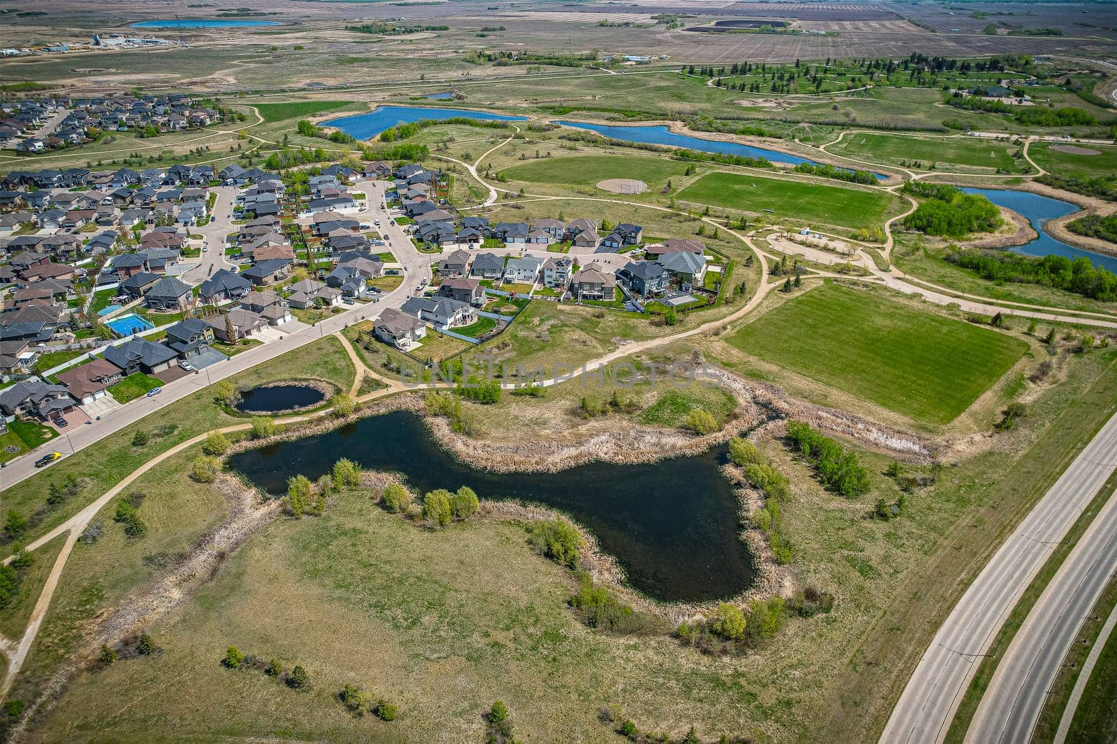 Aerial view of Briarwood which is a residential neighbourhood located in the southeast part of Saskatoon, Saskatchewan, Canada. The majority of its residents live in low-density, single detached dwellings.