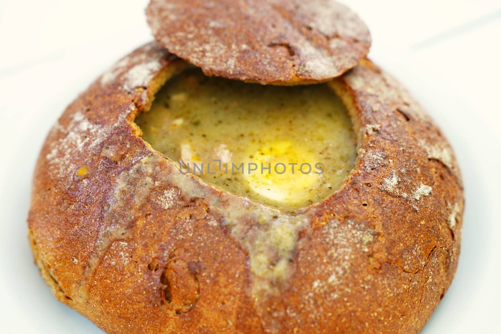 Traditional Polish National Dish: Delicious Soup Served in a Freshly Baked Bread Loaf by PhotoTime