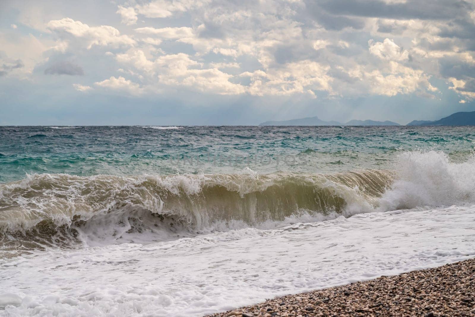 big waves hitting the Konyaalti coast on a stormy day by Sonat