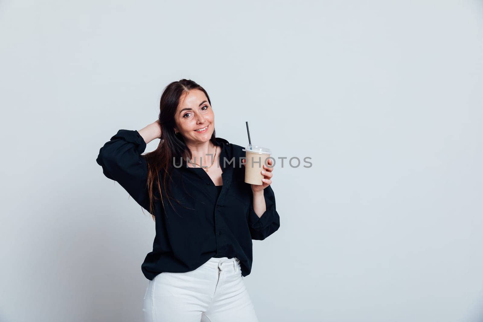 woman with a cup of hot coffee tea