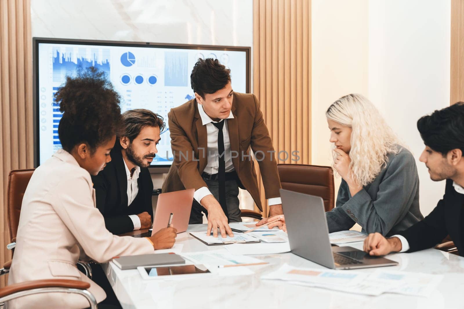 Portrait of professional smart business team discussion about start up project. Group of skilled businesspeople planing, brainstorming, sharing idea strategy. Discussion business meeting. Ornamented.