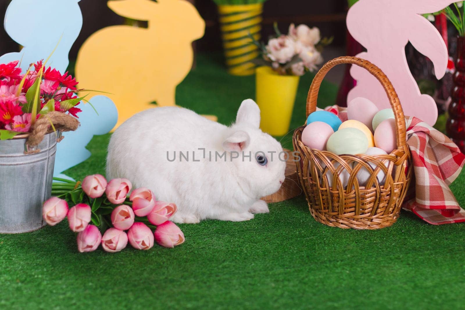 White rabbit in Easter decoration in horizontal orientation with selective focus