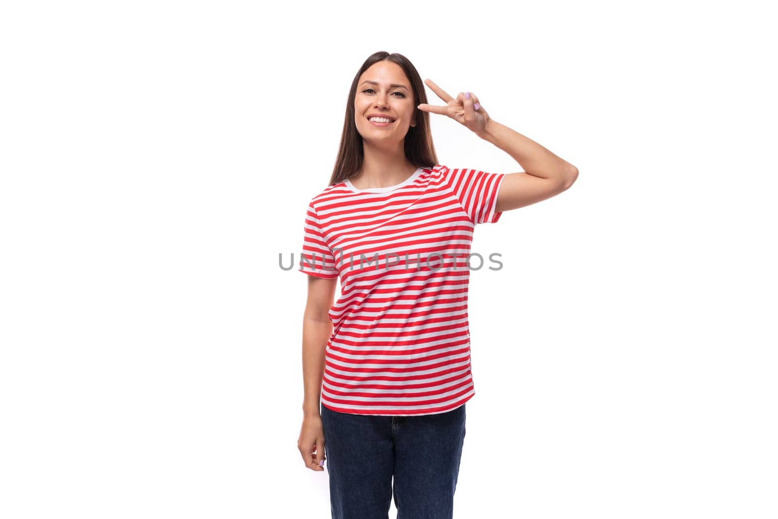 charming pretty 35 year old european lady in a red striped t-shirt on a white background with copy space.