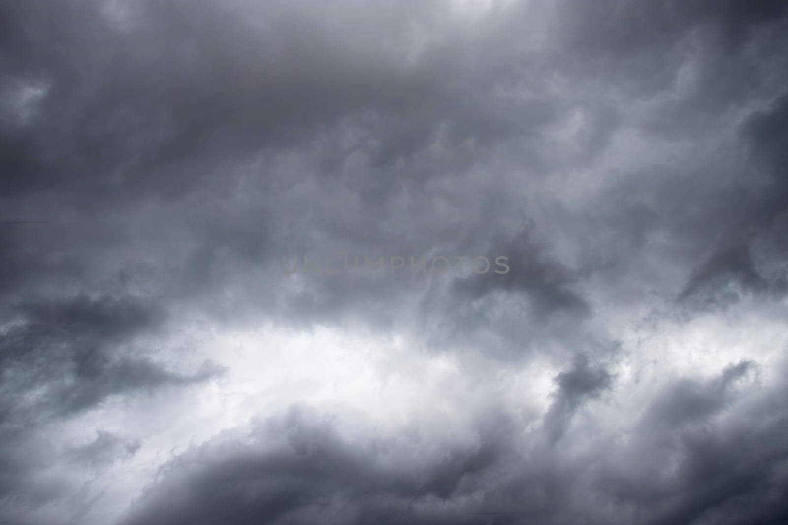 Background of dark clouds before a thunderstorm. Storm clouds.