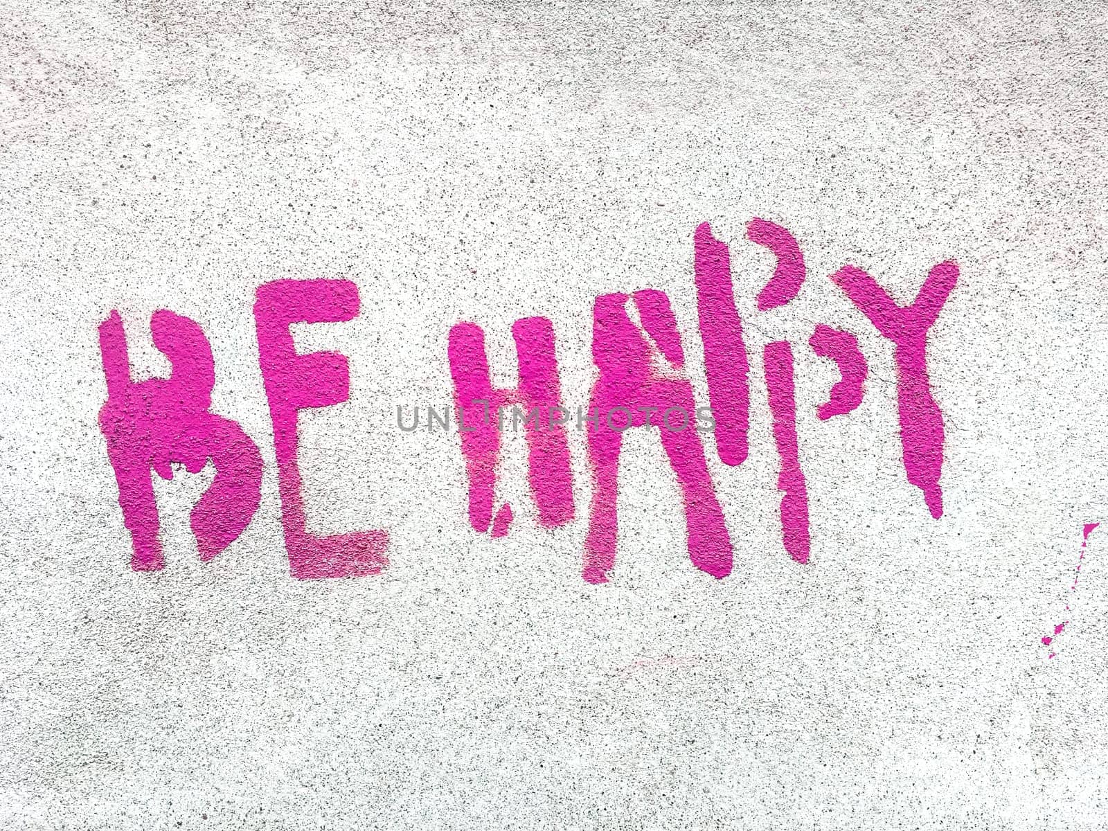 Pink Be happy written in graffiti style by germanopoli