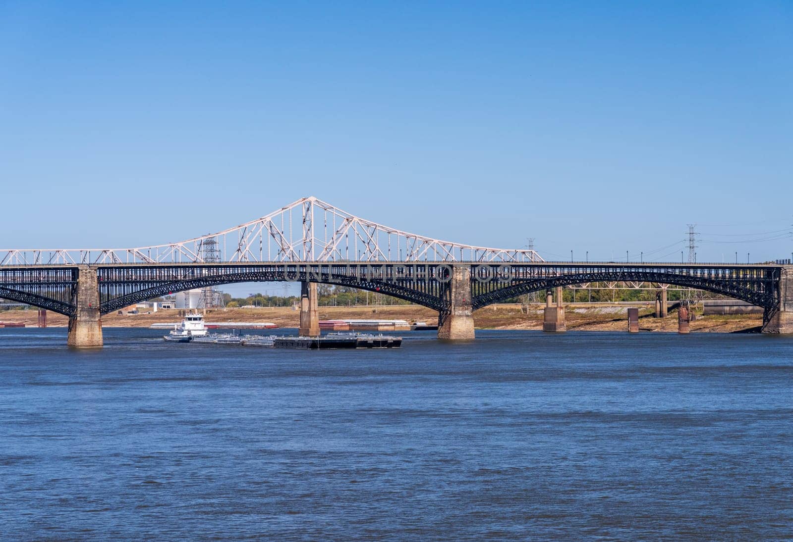 Pusher tug with petroleum barges on Mississippi river in St Louis MO by steheap