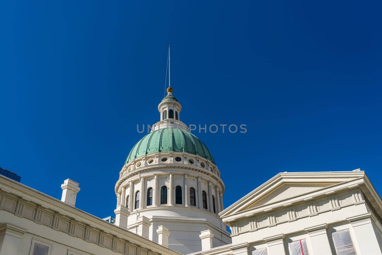 Dome of the old Courthouse in St Louis Missouri against the blue sky as renovations take place inside