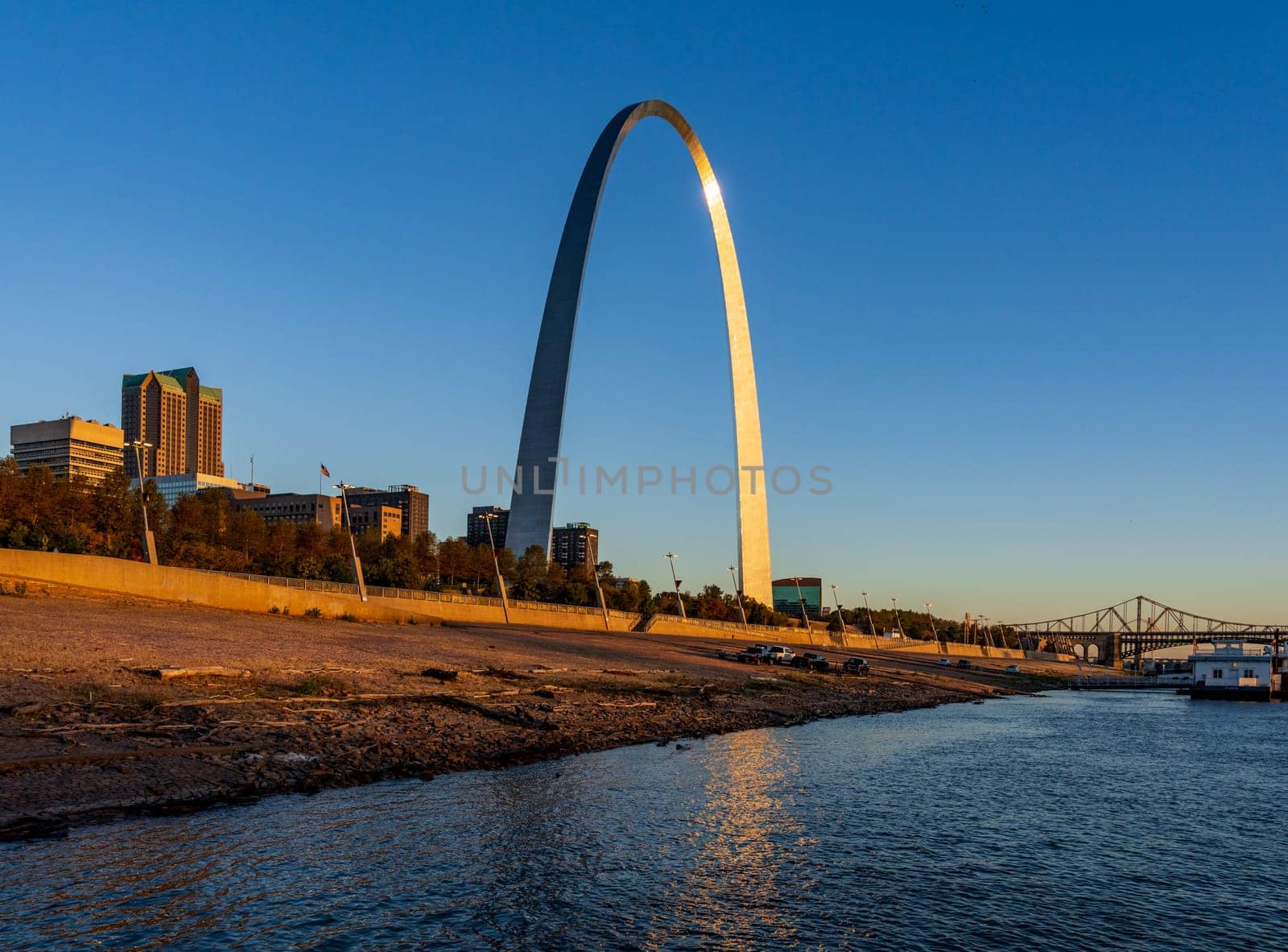 Unusual view of St Louis and Gateway Arch from Mississippi river by steheap