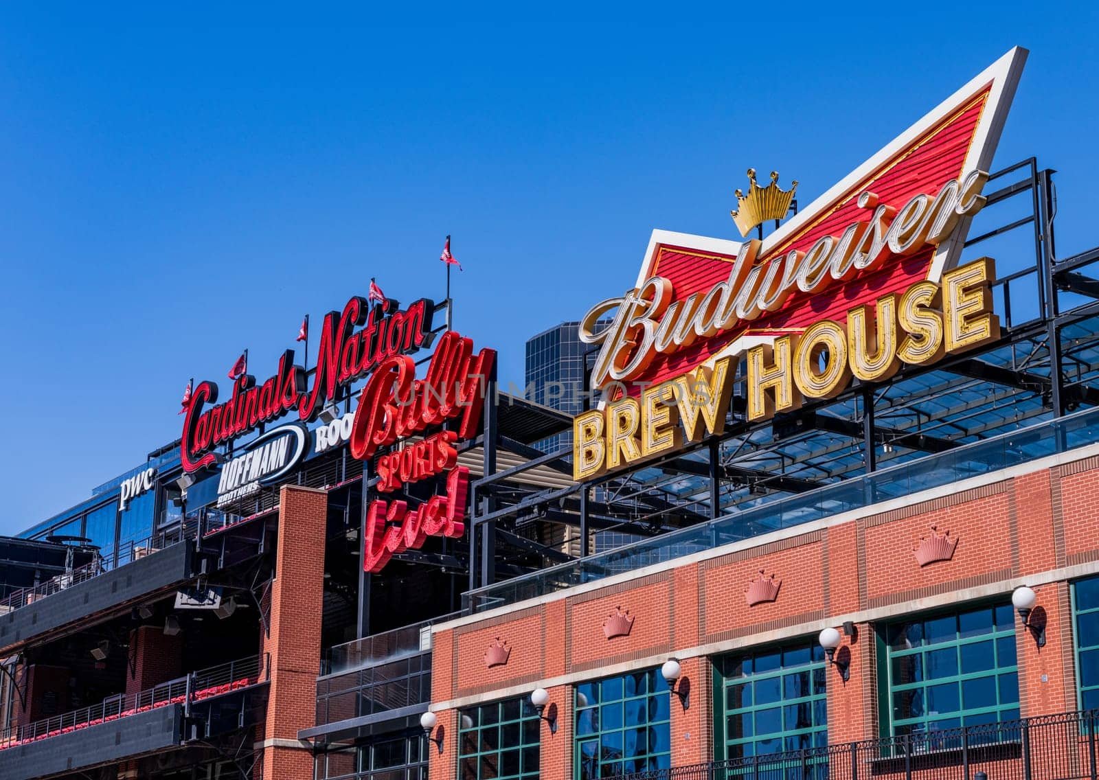 St Louis, MO - 21 October 2023: Rooftop Budweiser sign in the Saint Louis Ballpark Village dining and entertainment complex